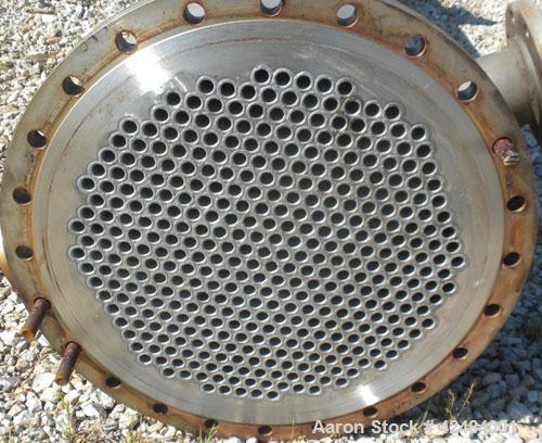Used Wolfe Mechanical and Equipment Single Pass Shell and Tube Heat Exchanger, 784 square feet, vertical. 304 Stainless steel shell rated 100 psi at 300 degrees F. (400) 3/4'' Diameter x 120’' long 3...