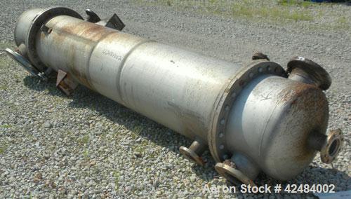 Used Wolfe Mechanical and Equipment Single Pass Shell and Tube Heat Exchanger, 1285 square feet, vertical. 304 Stainless steel shell rated 100 psi at 300 degrees F. (656) 3/4" Diameter x 120’' long 3...