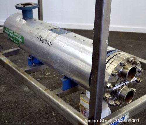 Used Yula Corporation U Tube Heat Exchanger, approximately 16 square feet, horizontal, model CV-2C-39BS. Carbon steel shell rated 150 psi at 300 degrees F. (13) 3/4 diameter x 39" long 316L stainless...