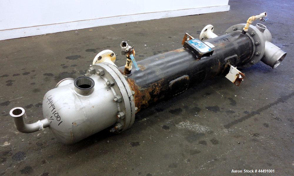 Used (INSTALLED BUT NEVER USED PER ELI LILLY) Yula Corporation Single Pass Shell & Tube Heat Exchanger, 67 Square Feet, Vertical, Model WC-1D-51AS. Carbon steel shell rated 125 psi at -20 to 300 degr...