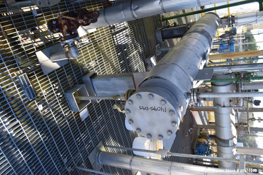 Used Yula 2 Pass Shell & Tube Heat Exchanger, 58 Square Feet, Model WC-2D-120BS, 316L Stainless Steel, Horizontal. 316L Stainless steel shell rated 100 psi at 40 to 500 degrees F. (36) 3/4" diameter ...