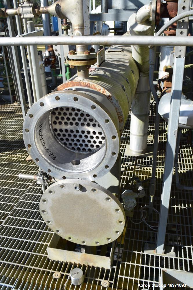 Used Yula 2 Pass Shell & Tube Heat Exchanger, Approximately 238 Square Feet, Model WC-2F-240CS, 304L Stainless Steel, Horizontal. 304L Stainless steel shell rated 150 psi at 40 to 375 degrees F. (76)...