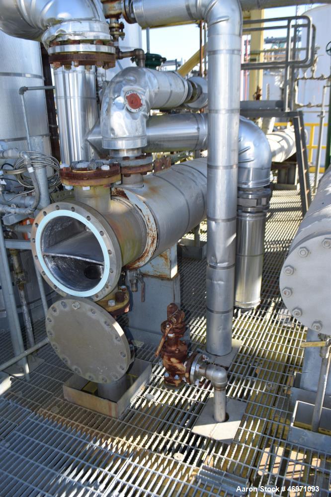 Used Yula 2 Pass Shell & Tube Heat Exchanger, Approximately 238 Square Feet, Model WC-2F-240CS, 304L Stainless Steel, Horizontal. 304L Stainless steel shell rated 150 psi at 40 to 375 degrees F. (76)...