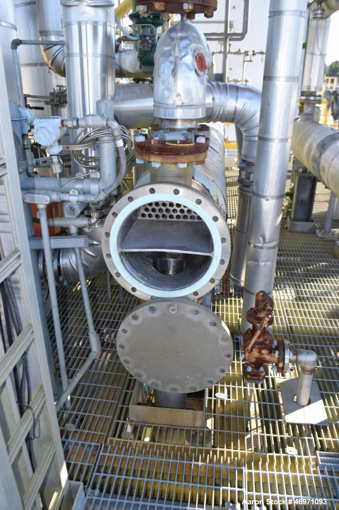 Used Yula 2 Pass Shell & Tube Heat Exchanger, Approximately 238 Square Feet, Model WC-2F-240CS, 304L Stainless Steel, Horizontal. 304L Stainless steel shell rated 150 psi at 40 to 375 degrees F. (76)...
