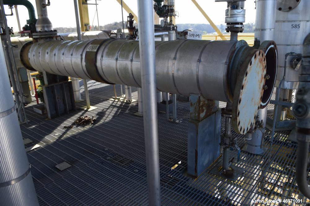 Used Yula 2 Pass Shell & Tube Heat Exchanger, 302 Square Feet, Model WC-2H-144BS, 304L Stainless Steel, Horizontal. 304L Stainless steel shell rated 75 psi at 40 to 250 degrees F. (130) 3/4” diameter...