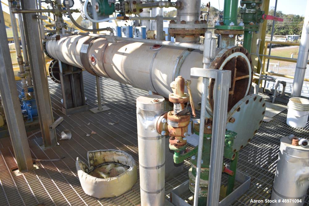 Used Yula 6 Pass Shell & Tube Heat Exchanger, 196 Square Feet, Model WC-6F-120BS, 304L Stainless Steel, Horizontal. 304L Stainless steel shell rated 80 psi at 40 to 250 degrees F. (102) 3/4” diameter...
