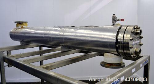 Used Yula Corporation U Tube Heat Exchanger, approximately 71 square feet, horizontal, model WCV-6C-90AS.304L Stainless steel shell rated 150 psi at 300 degrees F.(26) 5/8’’ diameter x 90" long 316L ...