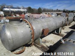 Used Praj Industries 1185 Sq. Foot Horizontal Shell and Tube Heat Exchanger. (2) saddle supports. (4) lifting trunnions. 304...