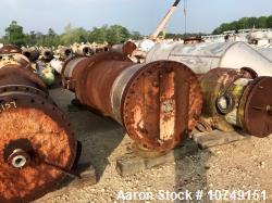 Used J. Oat & Sons Vertical Shell and Tube Heat Exchanger. 1130 sq. foot. With expansion joint. Carbon steel shell. 316 stai...