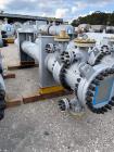 Used Wuxi Chemical Equipment 333 Square Foot Horizontal Shell and Tube Heat Exchanger. Duplex 2205 stainless steel tubes rated 288.3 psi at 32 to 330 degrees F, 16' 7'' Tube length. Carbon steel head...