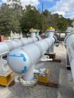 Used Wuxi Chemical Equipment Horizontal 234 Square Foot Shell and Tube Heat Exchanger. Duplex 2205 stainless steel tubes rated 532 psi at 32 to 430 degrees F, 9' Tube length, 130 tube holes. Carbon s...