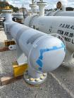 Used Wuxi Chemical Equipment Horizontal 234 Square Foot Shell and Tube Heat Exchanger. Duplex 2205 stainless steel tubes rated 532 psi at 32 to 430 degrees F, 9' Tube length, 130 tube holes. Carbon s...