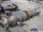 Used Atlas Heat shell and tube exchanger, 237 square feet. 316L stainless steel tubes, tube sheets, shell and bonnets, with (151) .75