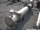 Used Atlas Heat shell and tube exchanger, 237 square feet. 316L stainless steel tubes, tube sheets, shell and bonnets, with (151) .75