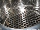 Used Atlas Heat shell and tube exchanger, 237 square feet. 316L stainless steel tubes, tube sheets, shell and bonnets, with (151) .75