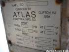 Used Atlas Heat shell and tube exchanger, 237 square feet. 316L stainless steel tubes, tube sheets, shell and bonnets, with (151) .75
