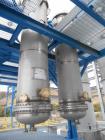 Unused- Shell and Tube Heat Exchanger, 265 Square Foot, Vertical. 304L Stainless steel shell rated 150 psi/FV at -30 to 300 degrees F. (76) 1-1/2