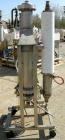 USED: Heat exchanger, approximately 31 square feet, 316 stainless steel, vertical. (88) 3/8