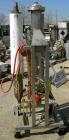 USED: Heat exchanger, approximately 31 square feet, 316 stainless steel, vertical. (88) 3/8