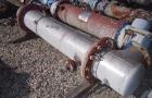 Used Shell And Tube Heat Exchanger, approximately 88 square feet. Stainless steel shell rated 60 psi, (90) 3/4