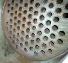 Used Shell And Tube Heat Exchanger, approximately 88 square feet. Stainless steel shell rated 60 psi, (90) 3/4