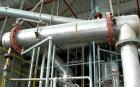 Used Shell And Tube Heat Exchanger, approximately 88 square feet. Stainless steel shell rated 60 psi, (90) 3/4