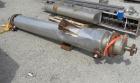 Used ADM Mason Shop Single Pass Shell & Tube Heat Exchanger, 65.8 Square Feet, Vertical. 316 Stainless steel shell rated 200/-15 psi at -20 to 400 deg F. (42) 3/4