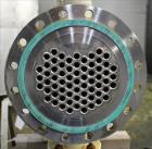 Unused- AT&F Advanced Metals Single Pass Shell and Tube Heat Exchanger, 76.2 Square Feet, Horizontal. Carbon steel shell rated 195 psi at -20 to 400 degrees F. (67) 3/4