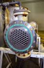 Unused- AT&F Advanced Metals Single Pass Shell and Tube Heat Exchanger, 76.2 Square Feet, Horizontal. Carbon steel shell rated 195 psi at -20 to 400 degrees F. (67) 3/4