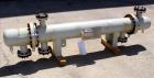 Unused- AT&F Advanced Metals Single Pass Shell and Tube Heat Exchanger, 76.2 Square Feet, Horizontal. Carbon steel shell rated 195 psi at -20 to 400 degrees F. (67) 3/4