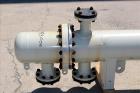 Unused- AT&F Advanced Metals Single Pass Shell and Tube Heat Exchanger, 76.2 Square Feet, Horizontal. Carbon steel shell rated 195 psi at -20 to 400 degrees F. (67) 3/4