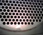 USED: Arjay Industries Ltwo pass shell and tube heat exchanger, 2777 square feet, horizontal. 304L stainless steel shell rated 150 psi at 200 deg F, (408) 1