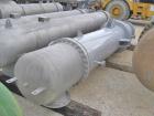 Unused- Atlas Industrial Single Pass Shell and Tube Heat Exchanger, 1274 square feet, vertical, type BEM 26-144. Carbon steel shell rated FV/150 psi at -20 to 400 deg F. (552) 3/4