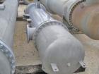 Unused- Atlas Industrial Single Pass Shell and Tube Heat Exchanger, 1274 square feet, vertical, type BEM 26-144. Carbon steel shell rated FV/150 psi at -20 to 400 deg F. (552) 3/4