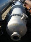 Unused- Atlas Industrial Single Pass Shell and Tube Heat Exchanger, 1274 square feet, vertical, type BEM 26-144. Carbon steel shell rated FV/150 psi at -20 to 400 deg F. (552) 3/4