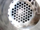 Used Atlas Industrial Shell and Tube Heat Exchanger, 43 square feet, vertical. Carbon steel shell rated full vaccum and 150 psi at 450 deg F, (55) 3/4