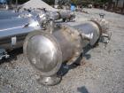 Used Atlas Heat shell and tube exchanger, 403 square feet. 316L stainless steel tubes, tube sheets, shell and bonnets, with (257) .75