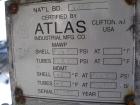Used Atlas Heat shell and tube exchanger, 403 square feet. 316L stainless steel tubes, tube sheets, shell and bonnets, with (257) .75
