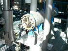 USED: Atlas four pass shell and tube heat exchanger, 17.6 square feet, horizontal. Carbon steel shell rated FV and 150 psi at 400 deg F, (28) 5/8