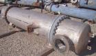 Used Atlas Shell And Tube Heat Exchanger,  411 square feet, vertical. Type BEM22-72. 316L stainless steel shell rated 100 psi at 300 deg.f., (350) 3/4