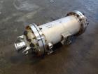 Used Chemineer Shell & Tube Heat Exchanger Static Mixer, Approximate 50 Square Feet, Vertical. 304 Stainless steel shell rated 150 psi at 100 degrees F. (64) 1