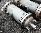 Used Chemineer Shell & Tube Heat Exchanger, 38 Square Feet, Horizontal. 304 Stainless steel shell rated 150 psi at 100 degrees F. (64) 1