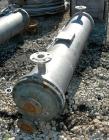 Used Doring & Baumer Six Pass Shell and Tube Heat Exchanger, 157 square feet, horizontal. 304 stainless steel shell rated 6 bar (87 psi) at 100 deg C (212 deg F). (200) 1/2