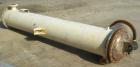 Used Doyle and Roth 4 Pass Shell and Tube Heat Exchanger, 478 square feet, vertical. Carbon steel shell rated 100 psi at –20 to 170 degrees F. (244) 3/4