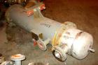 Used: Doyle and Roth shell and tube heat exchanger, 98 square feet, vertical. Carbon steel shell rated 100 psi at 100 deg.f., (126) 3/4