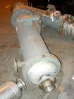 Used: Doyle and Roth shell and tube heat exchanger, 98 square feet, vertical. Carbon steel shell rated 100 psi at 100 deg.f., (126) 3/4