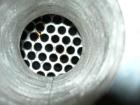 Used: Doyle and Roth shell and tube heat exchanger, 98 square feet, vertical. Carbon steel shell rated 100 psi at 100 deg.f., (126) 3/4