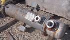 Used Doyle and Roth Shell and Tube Heat Exchanger, 98 square feet, vertical. Carbon steel shell rated 100 psi at 100 deg F, (126) 3/4