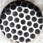 Used Doyle and Roth Shell and Tube Heat Exchanger, 98 square feet, vertical. Carbon steel shell rated 100 psi at 100 deg F, (126) 3/4