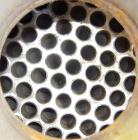 Used Doyle and Roth Shell and Tube Heat Exchanger, 98 square feet, vertical. Carbon steel shell rated 100 psi at 100 deg F, (126) 3/4